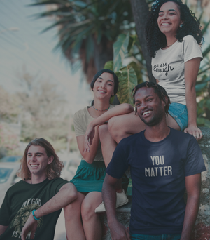 Group of people posing outdoors with 'Soso Swag' brand logo on a green background